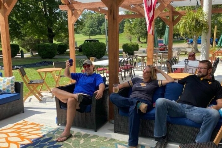 a group of people sitting in a chair