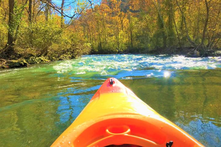 a small boat in a body of water