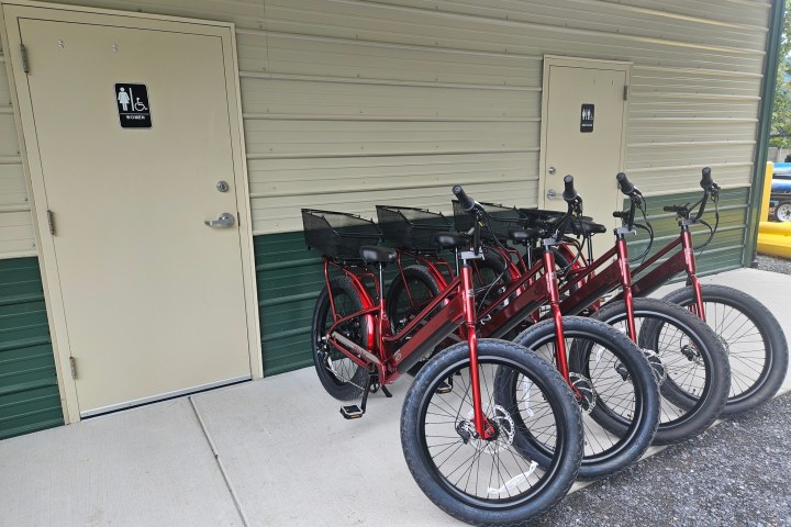 a bicycle parked on the side of a building